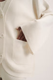 LEO merino wool cardigan with pockets, milk